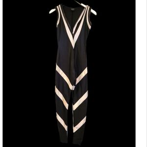 Scifi body suit by m8 costume designer.Blk/sliver metallic V neck fitted.Size M.